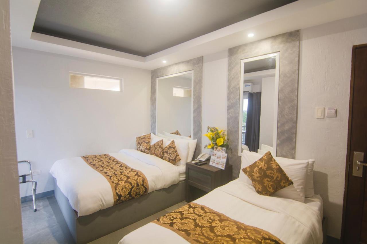 טוגגראו סיטי Hotel Carmelita מראה חיצוני תמונה