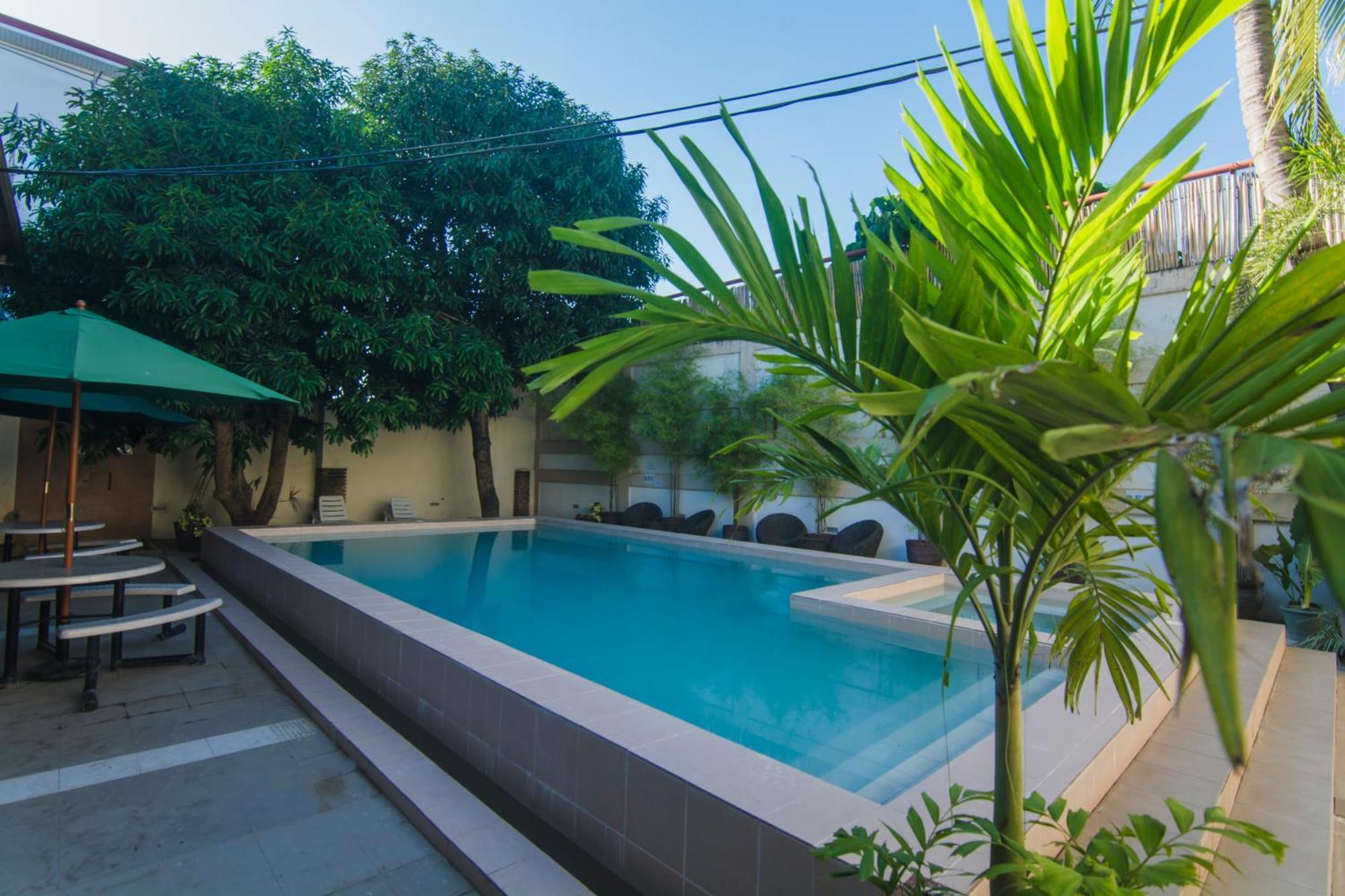 טוגגראו סיטי Hotel Carmelita מראה חיצוני תמונה